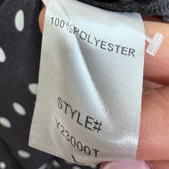 Pomander Place Tuckernuck Adair
Black Polka Dot Boyfriend Button Down Top. Large - Picture 9 of 11